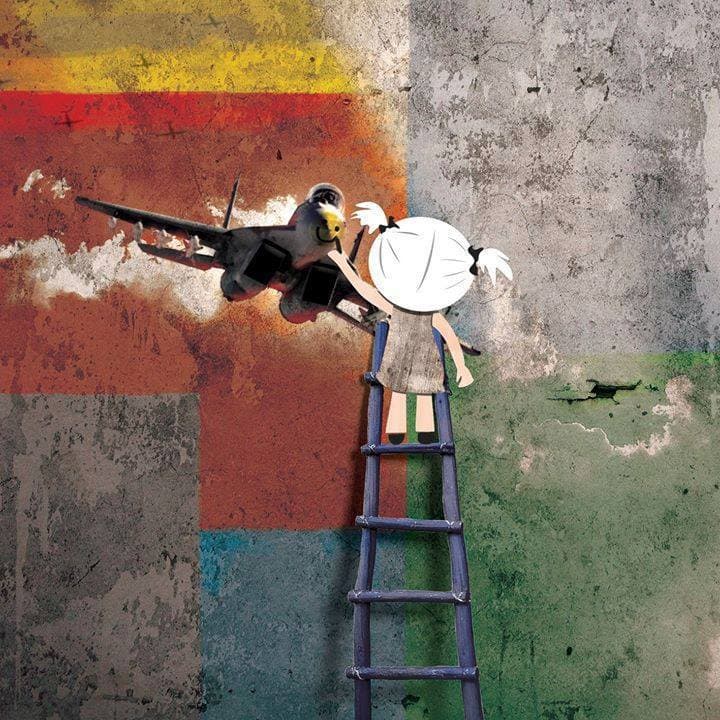 رسم لطفلة ترسم على الجدار