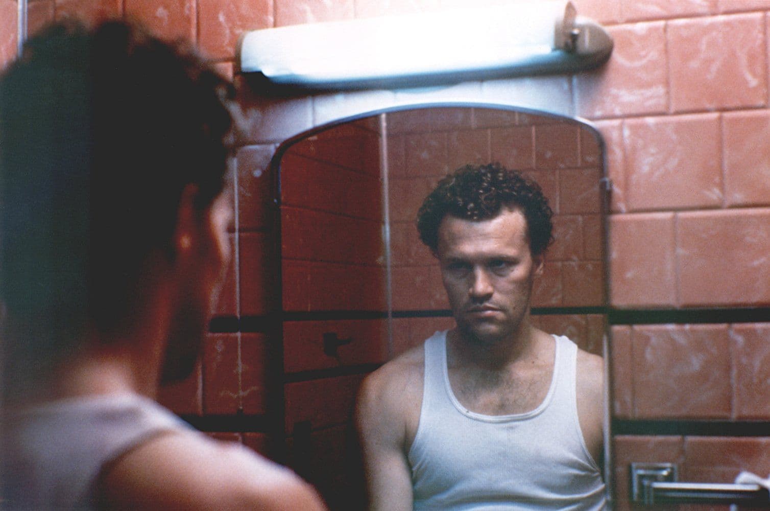 مايكل روكر في دور هنري لي لوكاس فيلم Henry: Portrait of a Serial Killer